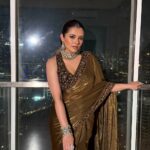 Women's Luxe Olive-Gold Silk Saree with Heavily Embellished Blouse & Border – Ideal for Evening, Wedding & Reception Wear 4 photo 6102478697857664830 y 1 Divohum
